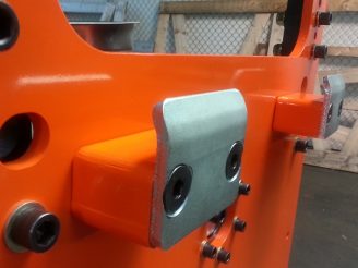 <p>We know rugged, shown is an impact pad to assist a jib crane operator in the loading of a fabrication in a rotary stage we designed.</p>
